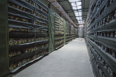 High-tech mining farm with rows of mining rigs